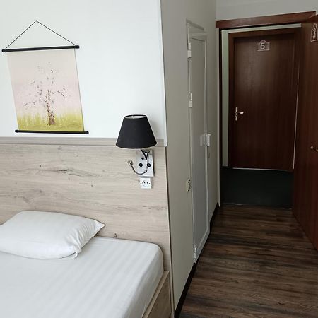 Sakura Inn Fargʻona Buitenkant foto