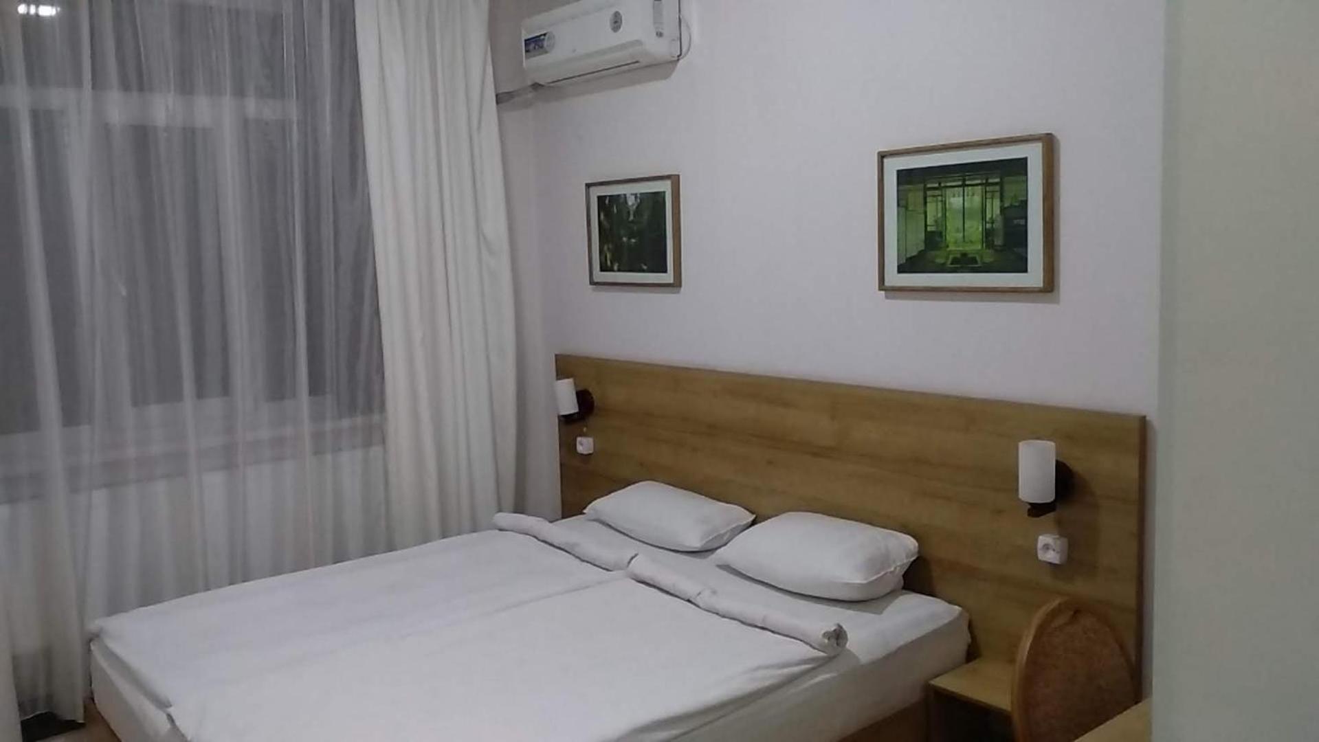 Sakura Inn Fargʻona Buitenkant foto
